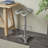 Cole And Grey Metal Weathered Antique Cast Iron Scroll Bar Stool With Cutout Textured Seat And Footrest
