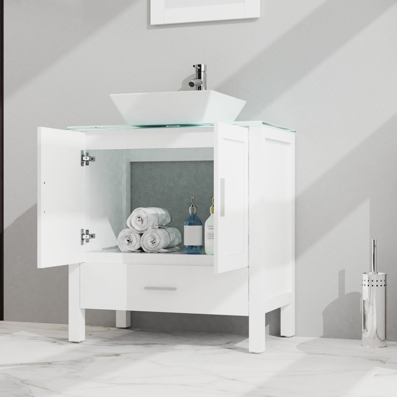 Meuble-lavabo blanc. Armoire en verre avec miroir. 18,5 * 30 * 31,5 pouces 2 portes, 1 tiroir. Vaste espace de rangement. Beaux-faits. Superbe plateau de 30 po à fonctionnement doux. Armoire. Surface généreuse.