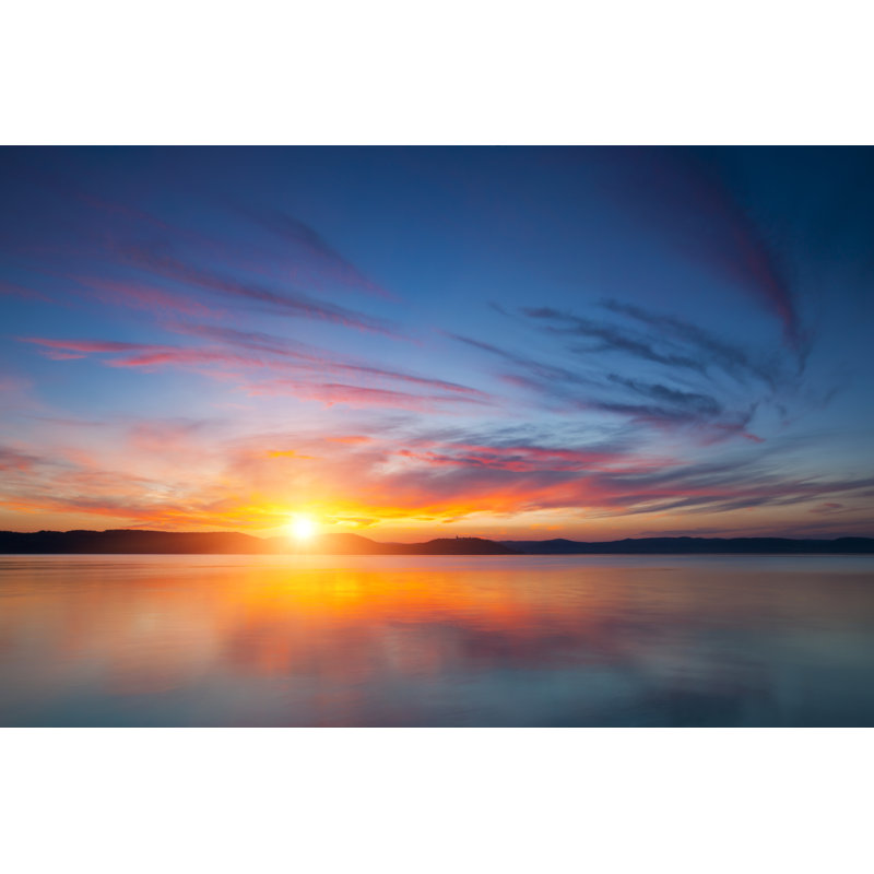 A Stunning View Of The Sunset Over Water by Focusstock - No Frame Art Prints on Canvas, 51cm H x 76cm W