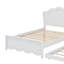 Élégant lit plateforme en bois avec tête de lit à motif floral et lit gigogne caché-999315653-999315655