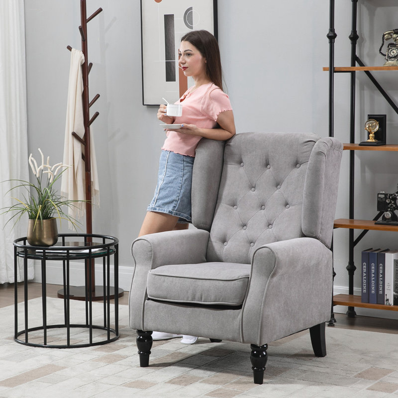 Fauteuil d'appoint capitonné à boutons avec haut dossier à oreilles, accoudoirs rembourrés arrondis et siège rembourré épais, gris