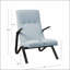 Fauteuil capitonné en tissu bleu clair au design élégant et aux sièges confortables, parfait pour la lecture et la détente
