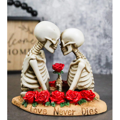 «Love Never Dies» Couple de squelettes tenant une tige de rose