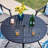 Basima 4 - Person Patio Dining Set with Round Table