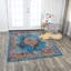 Tapis bleu/brun tissé à la machine Elliot-31943830