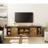 Laziza 78.6" W TV Stand for TVs up to 85" with Sliding Barn Doors and Open Storage
