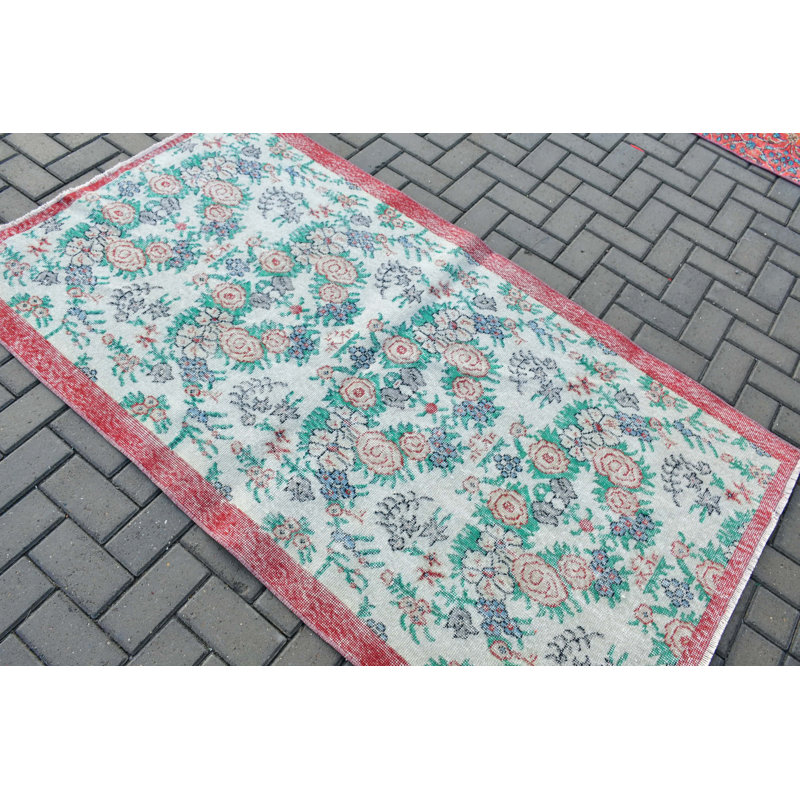 Handmade Vintage Turkish Accent Rug With Elegant Blue And Green Floral Design Framed By A Rich Red Border