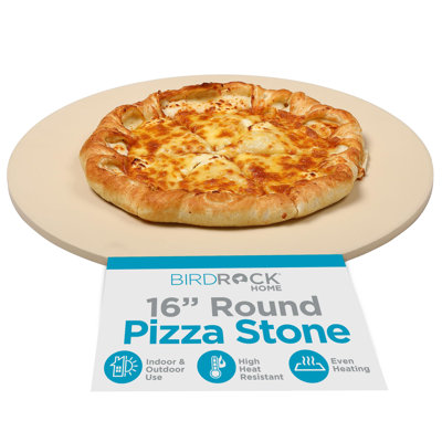 16-inch round beige cordierite pizza stone with a cooked cheese pizza on top.