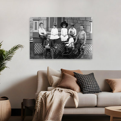 1890S 1900S Turn Of The Century Group Of Seven Children Sitting On & Around Porch One Girl On Old Fashioned Tricycle Classic Retro Vintage Portrait...