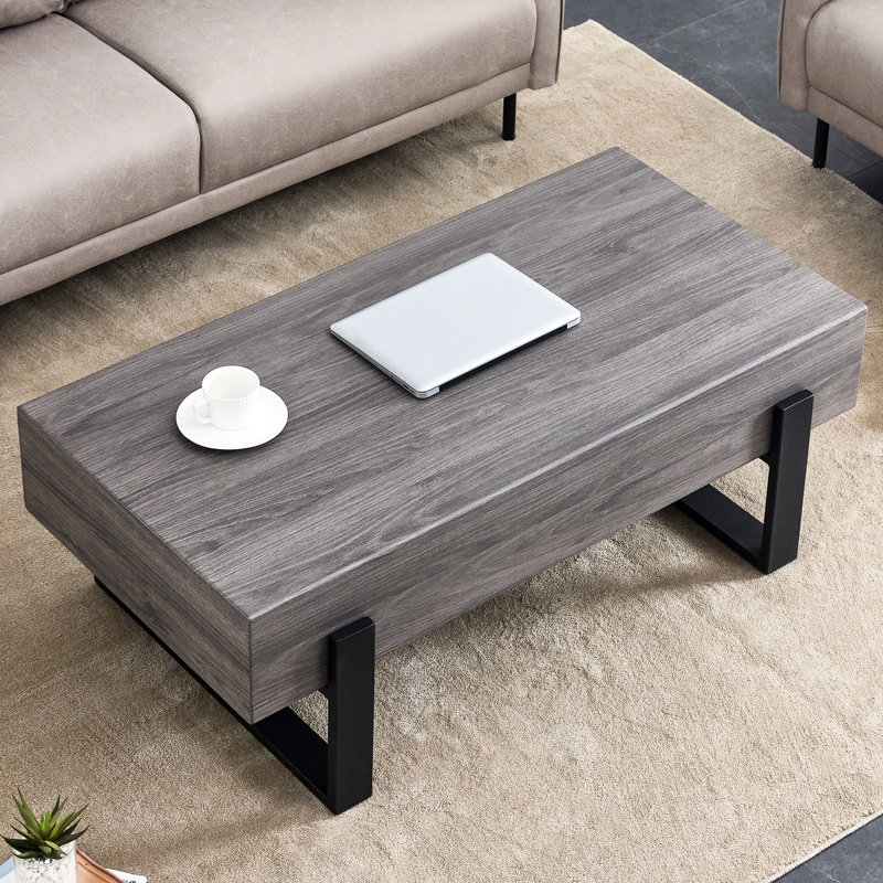 Élégante table basse rustique grise avec de solides modules en métal noir - polyvalente pour différents endroits