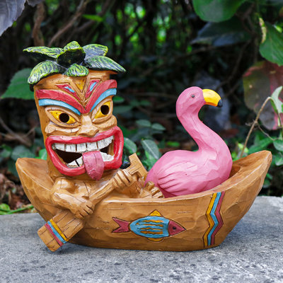 Solar Tiki Rowing in Boat with Flamingo Statue, 7.87" Resin Tropical Figurine with LED Lights, Spooky & Festive Outdoor Decor for Halloween, Christmas, Patio & Garden