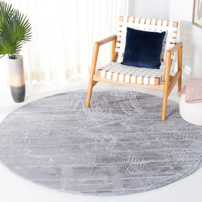 Tapis uni gris clair fabriqué à la machine
