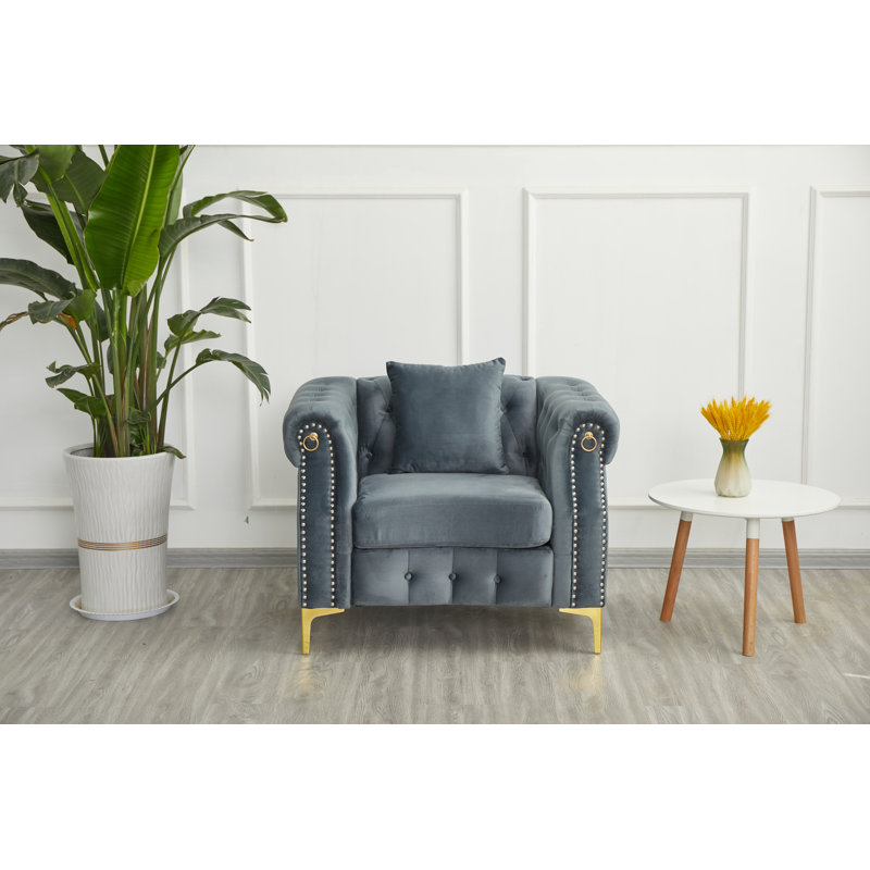 Fauteuil rembourré avec pieds en métal