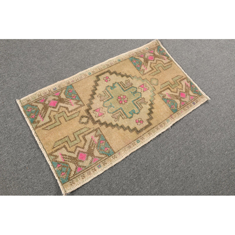 Handcrafted Anatolian Carpet: Small Vintage Turkish Wool Rug with Geometric Designs