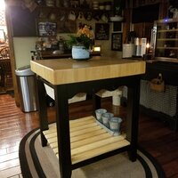 Behling Solid Butcher Block Kitchen Island with Baskets and Storage Shelf