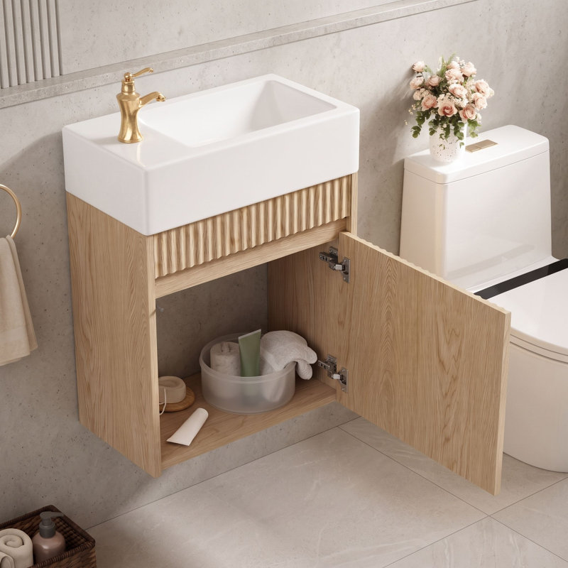 Meuble-lavabo suspendu de 47 cm (18,5 po) avec lavabo réversible en résine (gauche ou droite) et porte à ouverture par simple pression