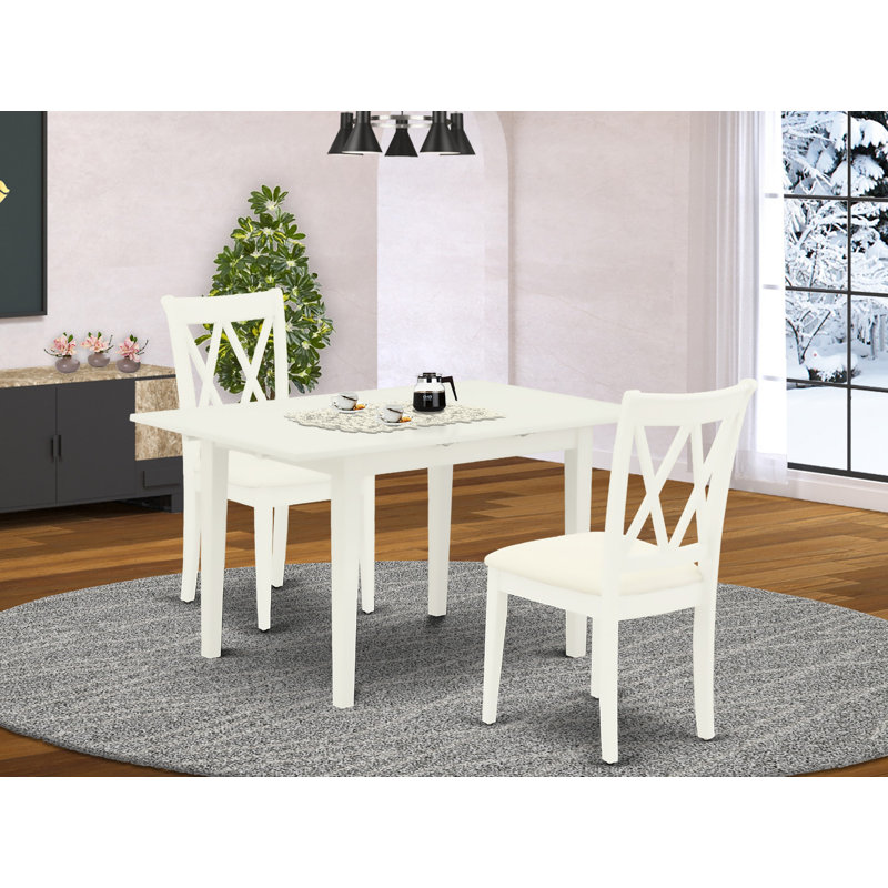 L'ensemble de salle à manger 3 pièces contient une table de salle à manger rectangulaire avec rallonge papillon et 2 chaises de cuisine en lin, blanc lin