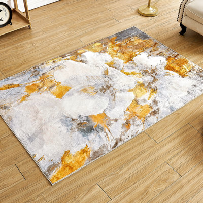 Tapis abstrait antidérapant lavable à la machine Katon en jaune / blanc / gris pour le salon, la chambre à coucher, les tapis d'intérieur de couloir