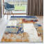 Tapis bleu / jaune à motif abstrait Bellicent-903353060