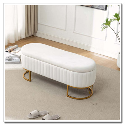 Banc de rangement avec revêtement en velours et pieds en métal doré