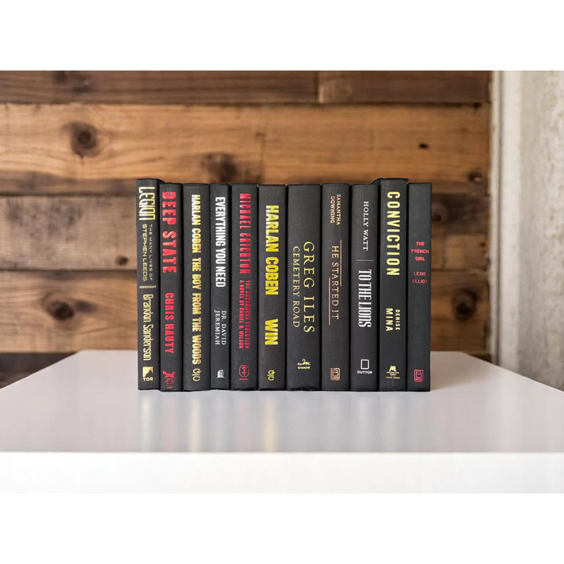 Étude de livres décoratifs noirs (au pied)