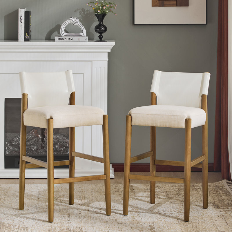 Ensemble de tabourets de bar en tissu noir d'inspiration Mid-Century, siège rembourré confortable avec structure en bois d'hévéa robuste pour une décoration intérieure élégante.