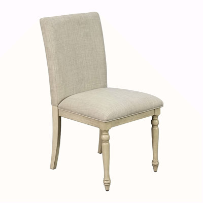 Chaise rembourrée avec pieds tournés en bois