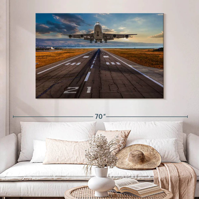 Décollage de l'avion Mehar, H 34 po x l 51 po