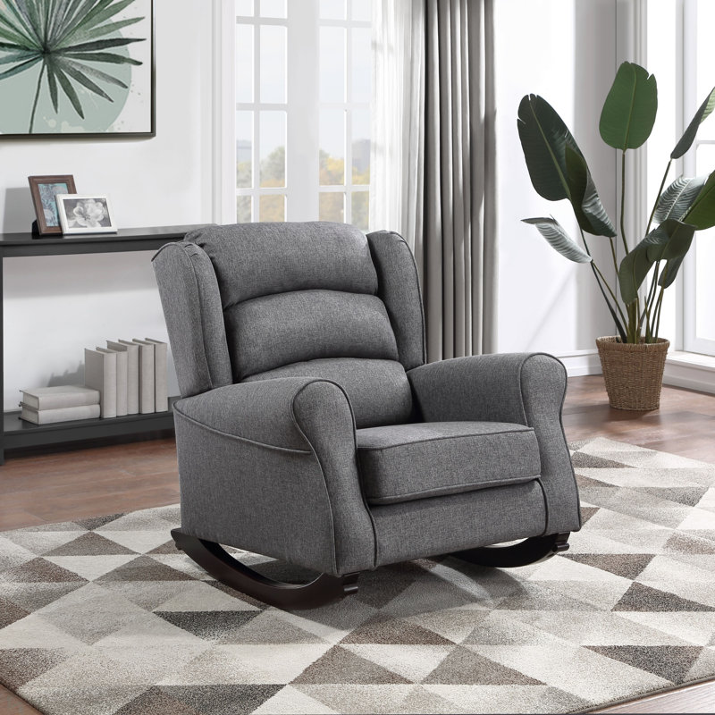 Chaise berçante grise avec accoudoirs évasés