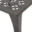 Table d'appoint d'extérieur durable avec une finition résistante aux intempéries, parfaite pour la décoration de patio et de jardin.