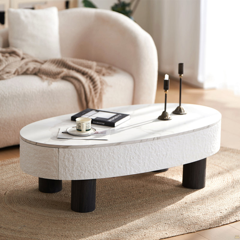 Table basse ovale avec plateau en faux marbre