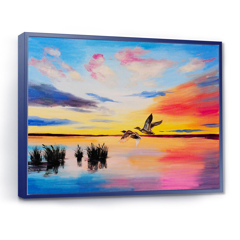Grues volant pendant un coucher de soleil coloré - peinture sur toile, H 16 po x l 32 po x p 1 po, Cadre flottant bleu