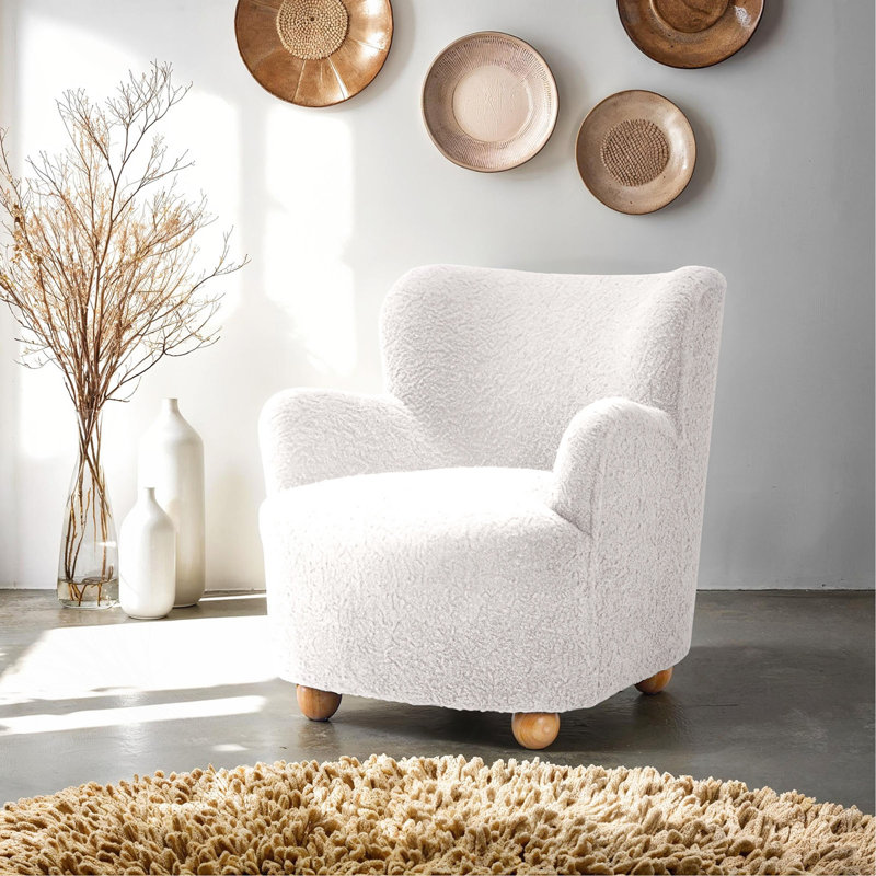 Fauteuil d'appoint blanc avec dossier courbé et accoudoirs inclinés