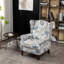 Fauteuil rembourré floral bleu avec structure en pin et courbé pour le confort de la chambre à coucher