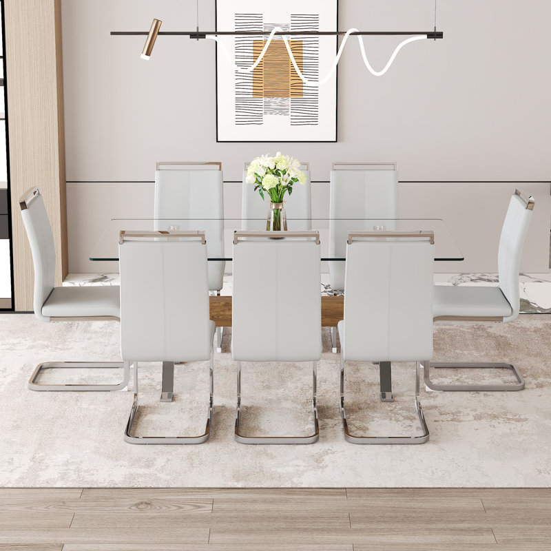 Élégante expérience culinaire avec verre trempé et cuir PU, design contemporain pour les réunions de famille
