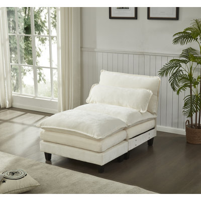 Fauteuil et repose-pieds Luqi