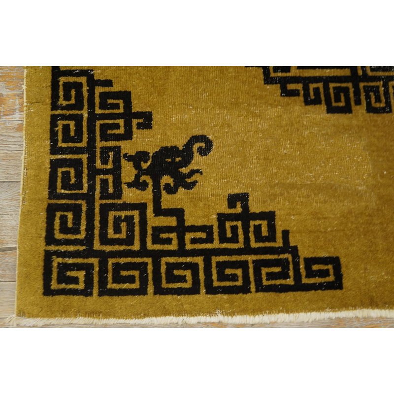 Tapis noir et jaune antique en laine de petite taille