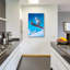 Trinx «The Downhill Race» par Cindy Thornton, art mural en verre acrylique, 24 po x 36 po