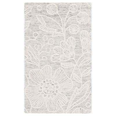 Tapis floral en laine touffeté à la main