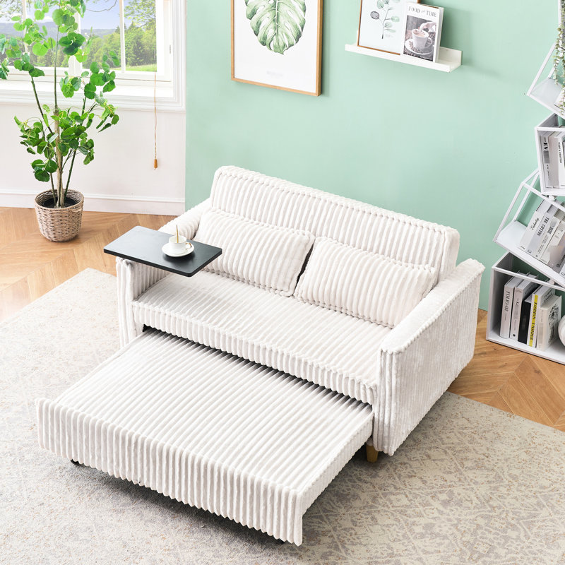 Confortable convertible en velours côtelé beige avec plateau de table mobile et, améliorant votre confort et votre table, pour travailler