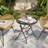 Hicham 17.7 L x 17.7 W Folded Outdoor Side Table with Glass Round Top-860741551-838657391