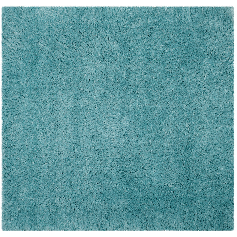 Hermina Light Turquoise Area Rug