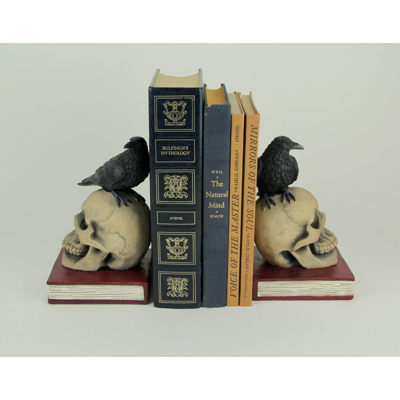 Gothic Evil Omen raven on skull resin decorative bookend set with black, beige and brown finish — 7 in. H x 4.5 in. L x 4 in. W
