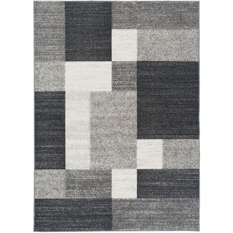 Tapis gris, noir et blanc touffeté à motif géométrique Akieba