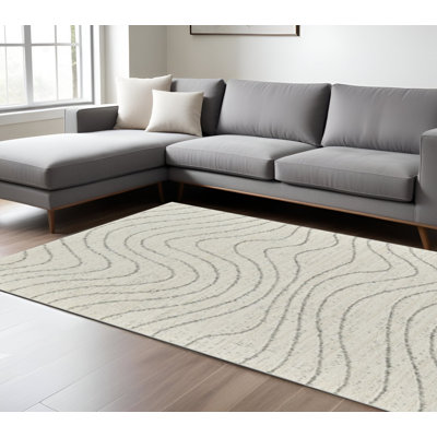 7' X 10' Cream and Beige Abstract Area Rug