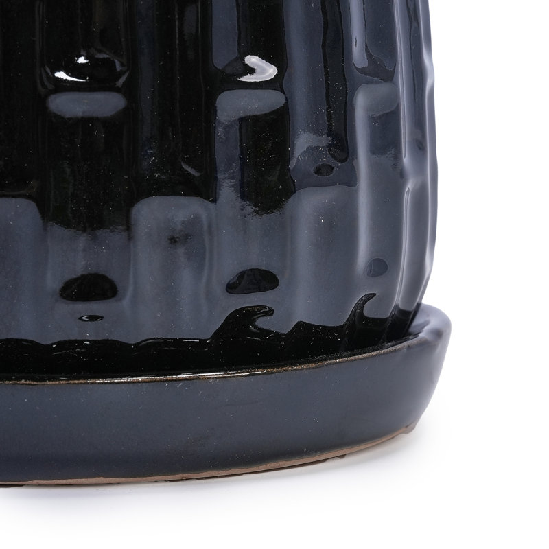Jardinière en céramique durable, noir brillant, élégance moderne pour les espaces intérieurs et extérieurs