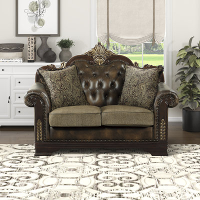 Flippin 64" Traditional Faux Leather and Microfiber Loveseat with Button-Tufting, Nailhead Trim & 2 Decorative Pillows