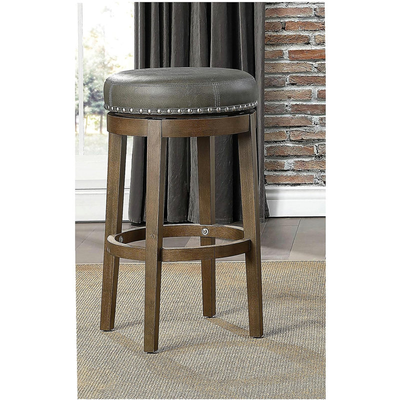Ensemble de 2 tabourets de bar rotatifs circulaires, en similicuir gris, pivotant à 360 degrés, avec décoration cloutée, structure en acajou, meubles en laque brune