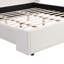 Lit tapissier élégant en tissu blanc avec tête haute-983140862