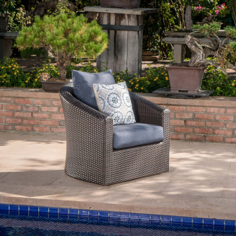 CHAISE CLUB PIVOTANTE DARIUS, Coussin bleu / cadre brun foncé
